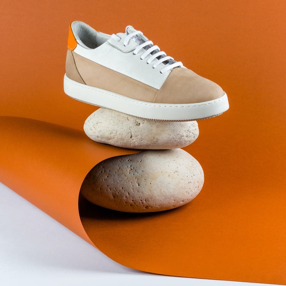 Fall Limited Edition Sneakers balanced on rocks